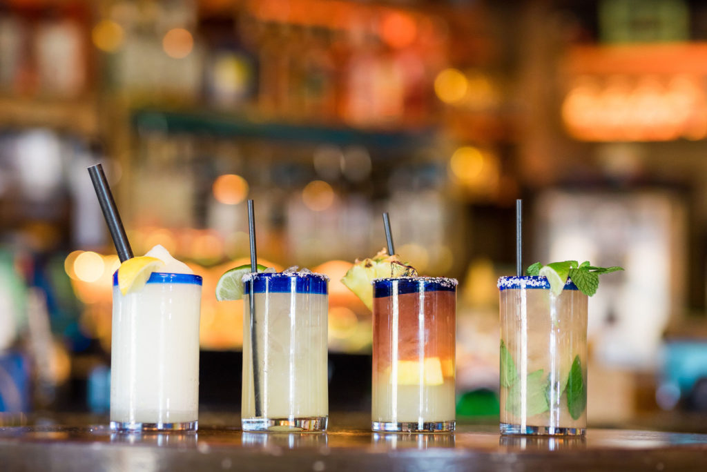 Azul_Latin_Kitchen_Lauren_Lindley-44 Four different frozen cocktails and margaritas on display in front of the brightly lit and inviting bar at Lake Tahoe local's favorite Azul Latin Kitchen.