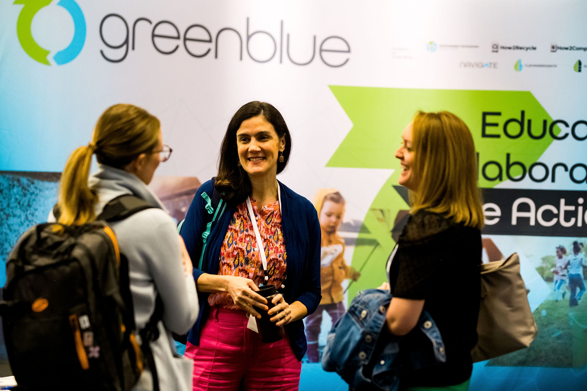 Conference attendees networking between sessions in New Orleans