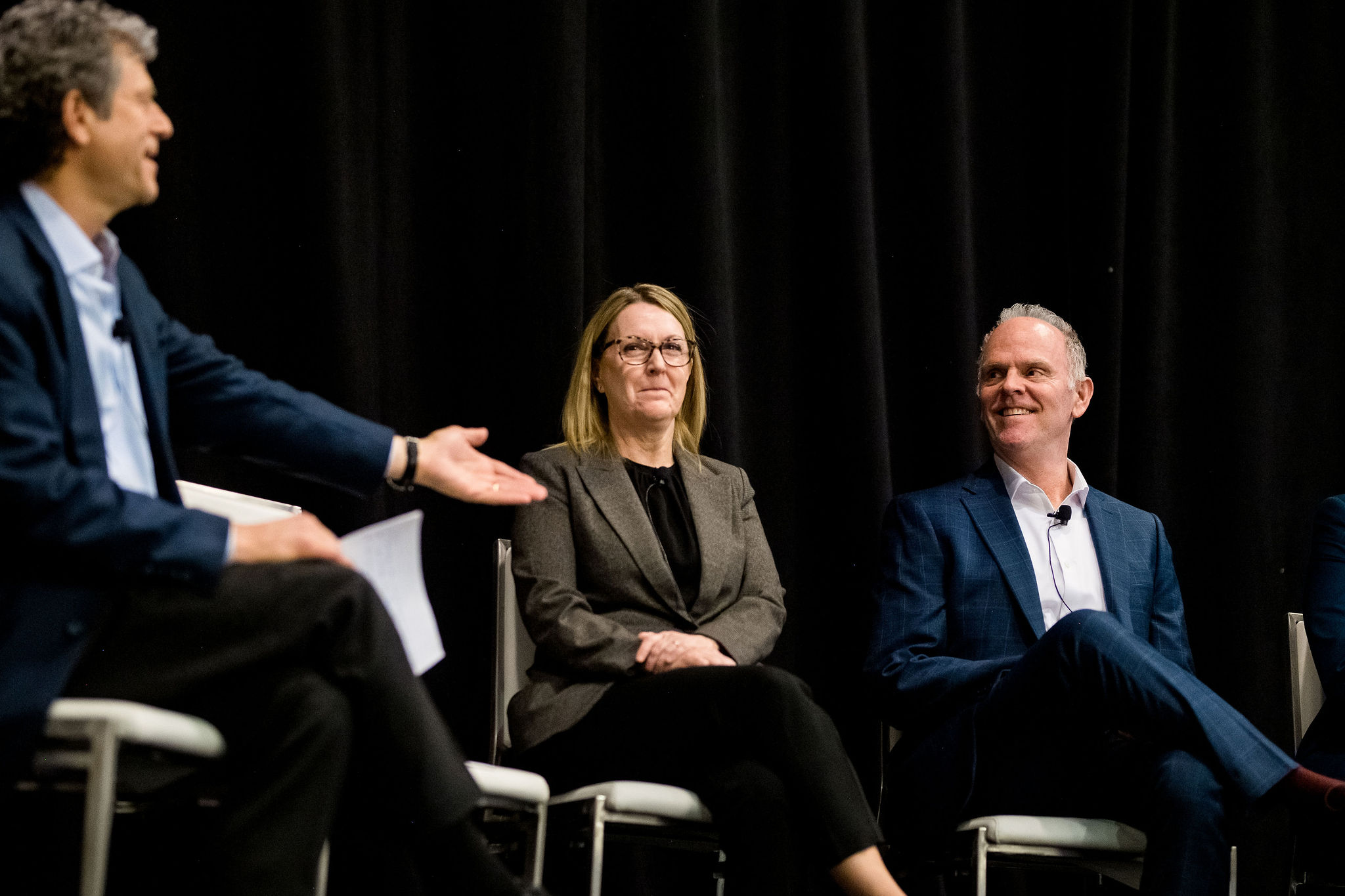 Panelists presenting on stage at SPC Impact 2024 in New Orleans