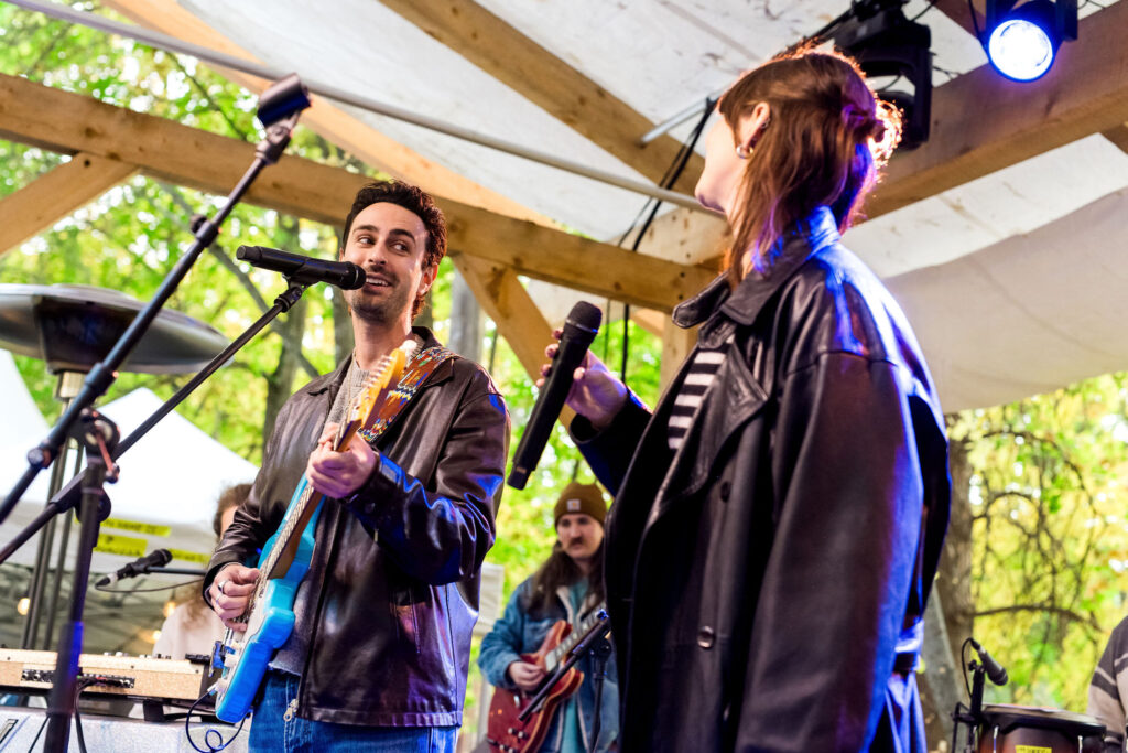 Jesse Gold and Katie Tupper on stage at Stone Family Field Trip at the Zephyr Lodge Liberty Lake.