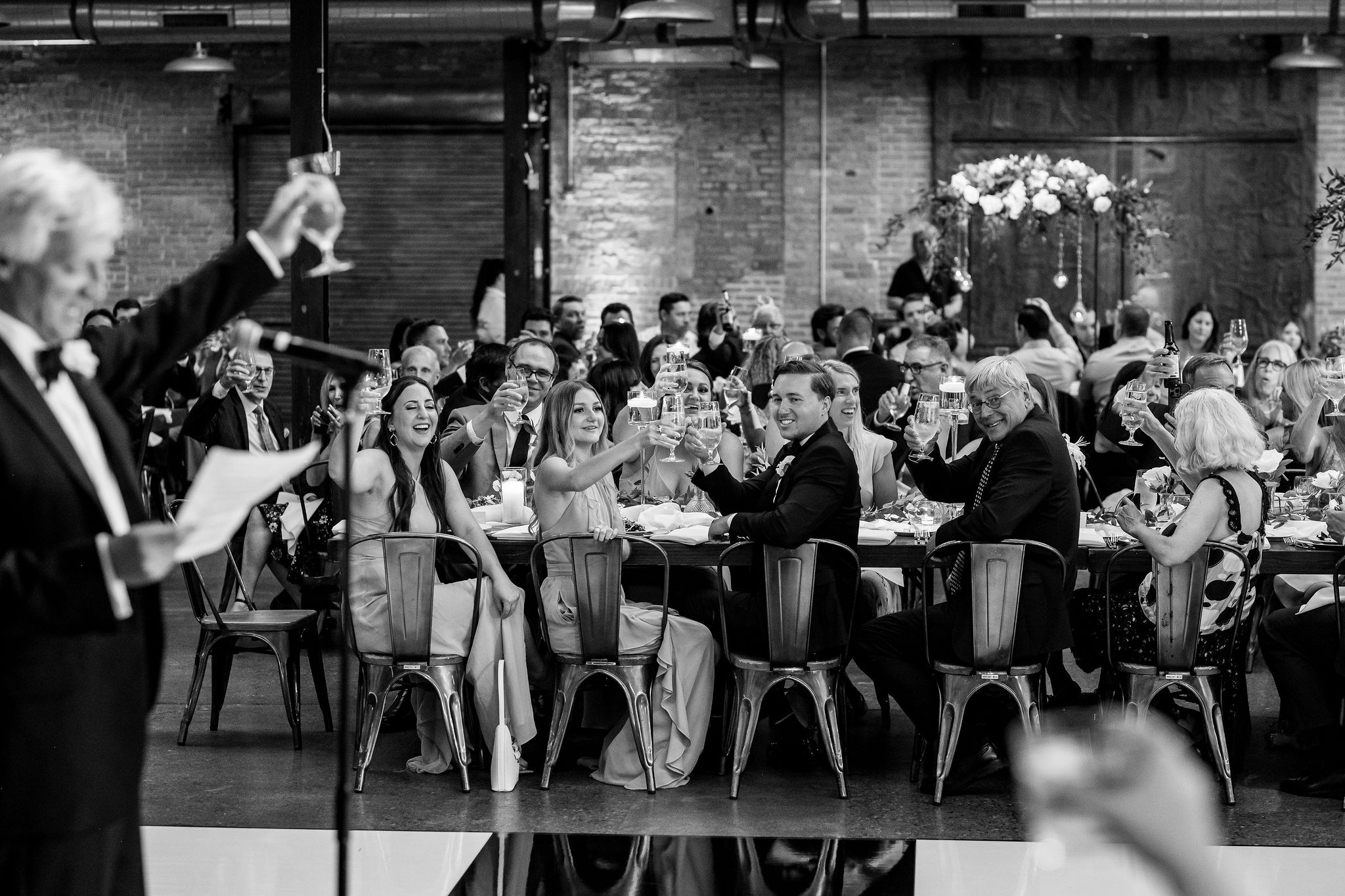 Chicago-Wedding-Photographer-1499 Toast photos at a wedding reception at Morgan Manufacturing in Chicago